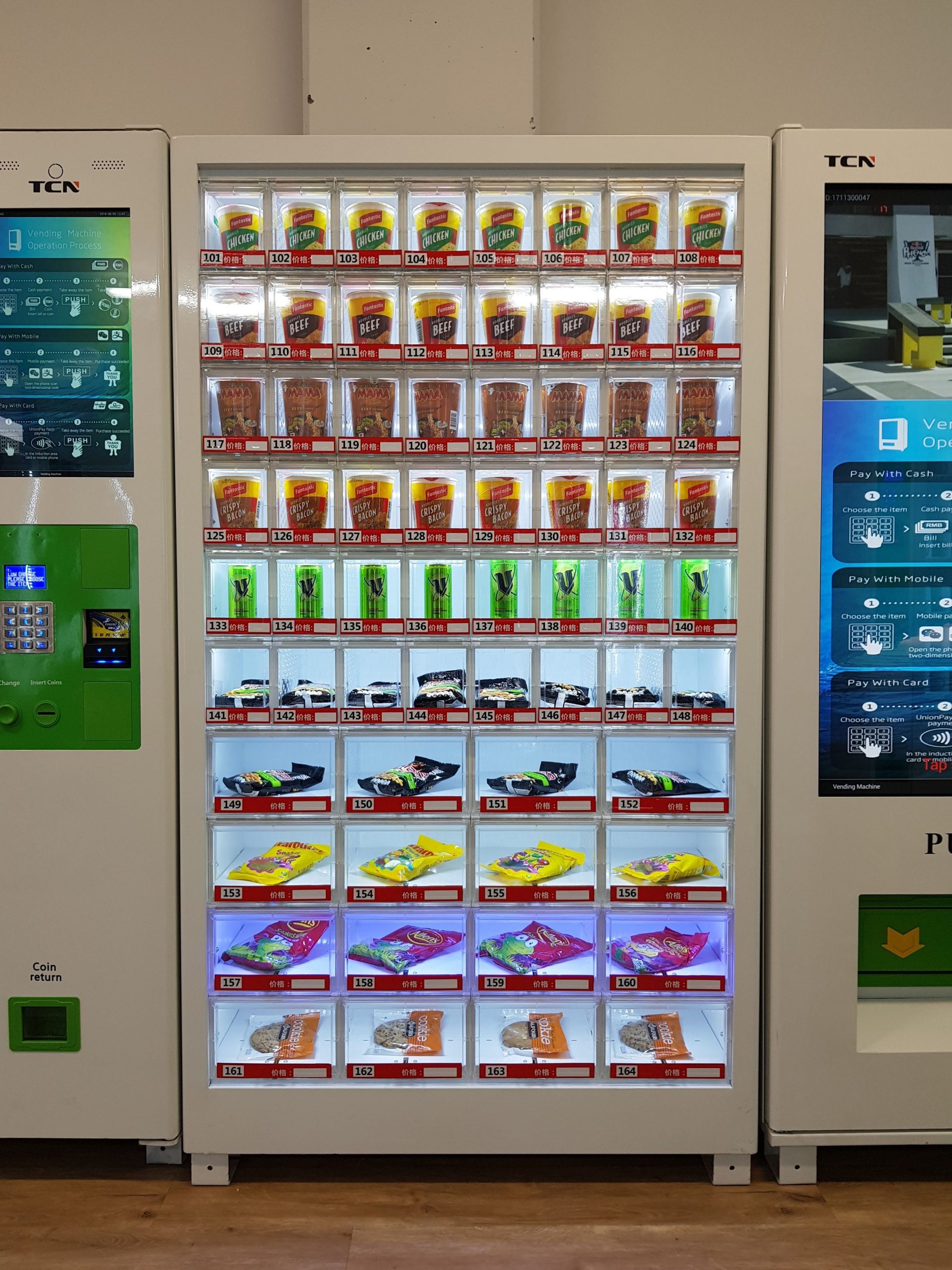 Vending machines with lighted displays